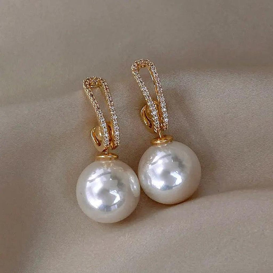 Elegante Ohrringe mit Perlen und Brillanten