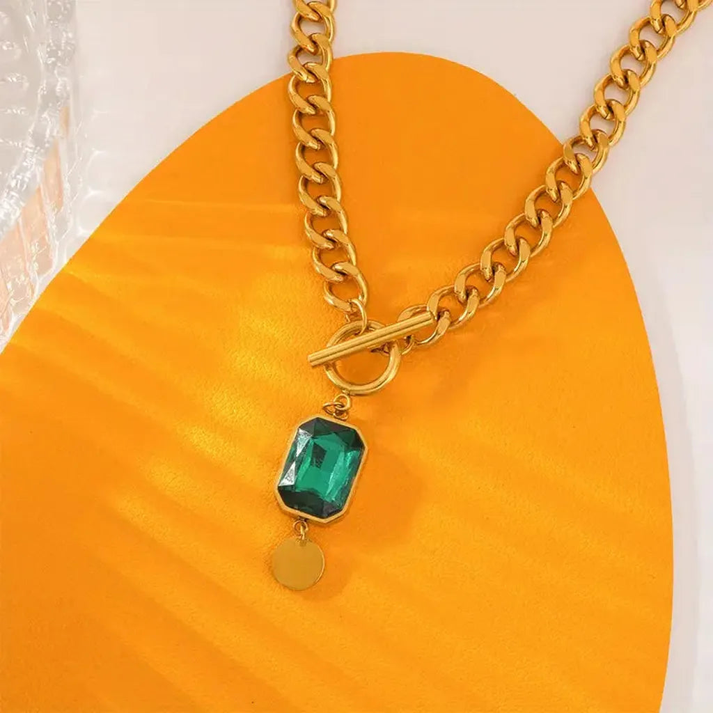 Halskette mit grosser Kette und Smaragd-Anhänger | Gold
