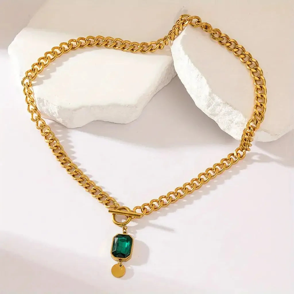 Halskette mit grosser Kette und Smaragd-Anhänger | Gold