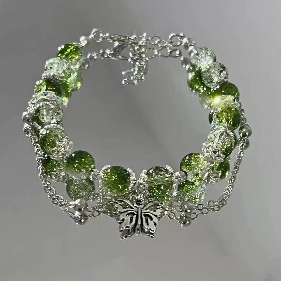Retro-Armband mit Schmetterling in Weissgold und grünen Perlen