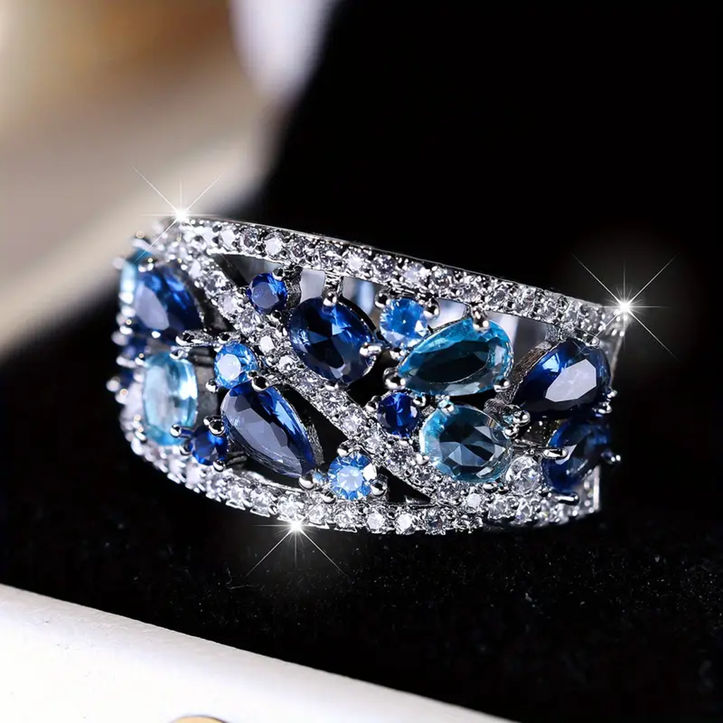 Vintage-Ring in Weissgold mit blauem Glanz